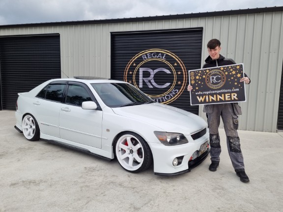 PAUL CLARKE FROM COUNTY SLIGO-WINNER OF 2003 WHITE LEXUS IS200 SPORT TURBO