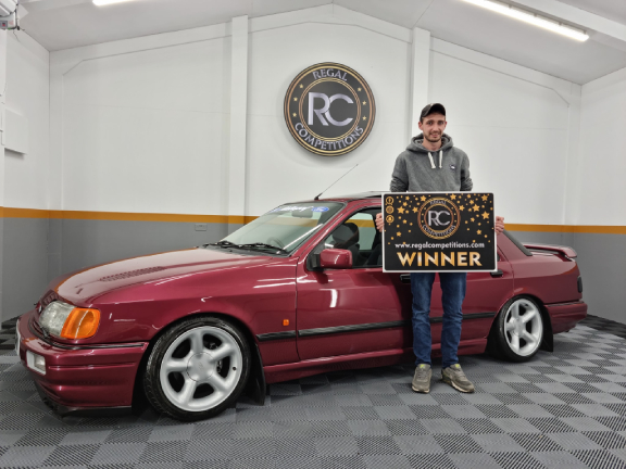 IAN McAULIFFE FROM CO.CORK- WINNER OF 1992 FORD SIERRA SAPPHIRE