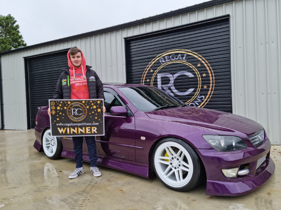 PADDY BURKE FROM CO.CORK- WINNER OF 2002 PURPLE LEXUS IS200 SPORT TURBO